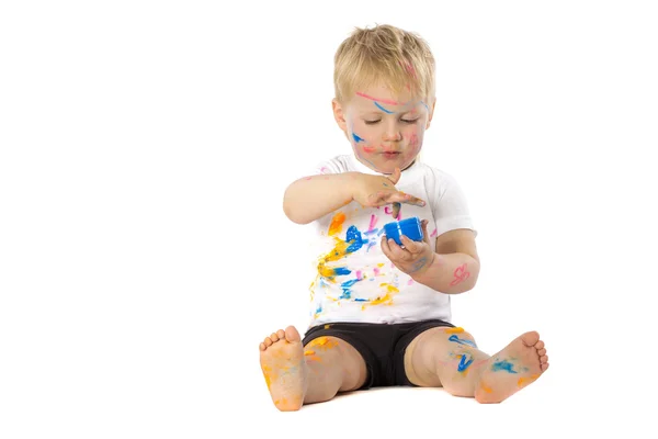 Blond kid paint plays — Stock Photo, Image