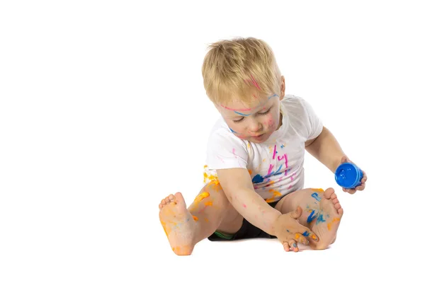 Blond kid paint plays — Stock Photo, Image