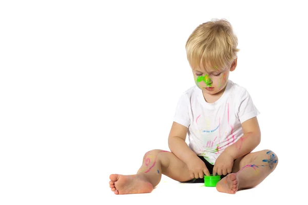 Blond kid paint plays — Stock Photo, Image