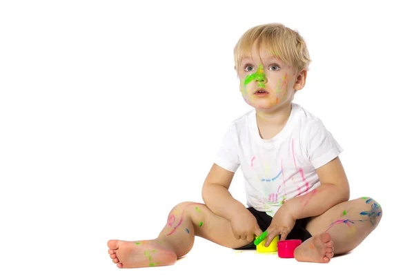 Blond kid paint plays — Stock Photo, Image