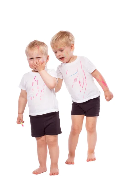 Children draw colored chalk on each other — Stock Photo, Image