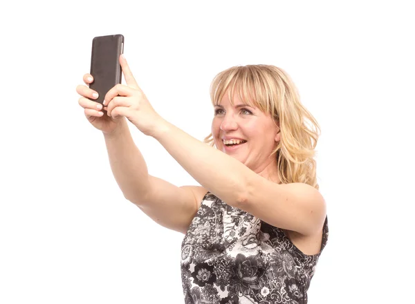 Mooie vrouw nemen zelf foto met smartphone camera — Stockfoto