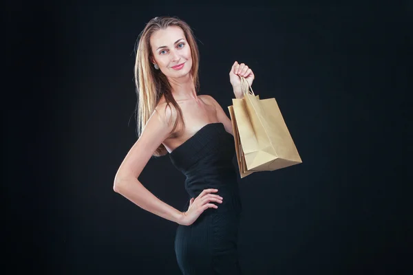 Donna bionda con borse della spesa — Foto Stock