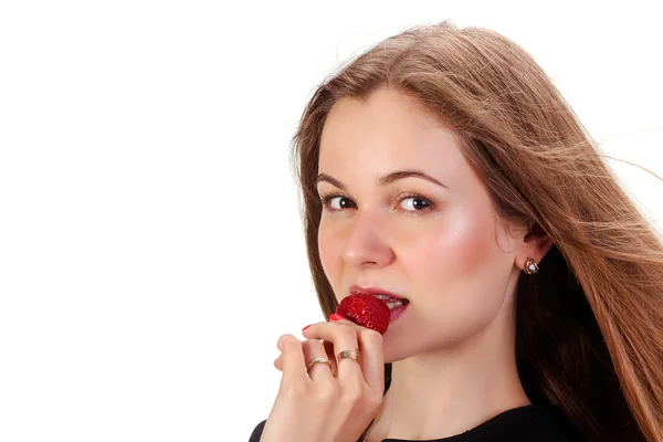 Pretty woman with strawberry in hand isolated on white Royalty Free Stock Photos