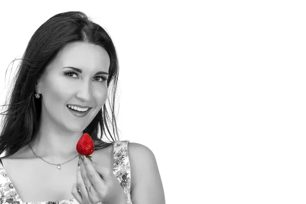 Pretty woman with strawberry in hand isolated on white — Stock Photo, Image