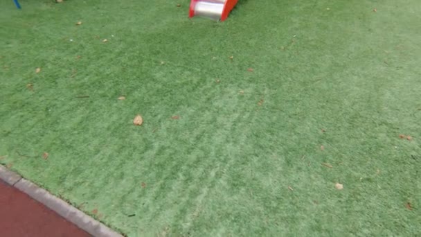 Empty playground on morning light in city park. — Stock Video