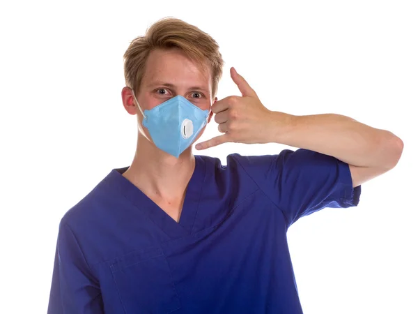 Portrait of a charming medical doctor gesturing call me with his — Stock Photo, Image