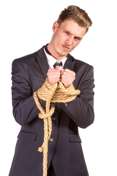 Affärsman som binds upp i rep. — Stockfoto