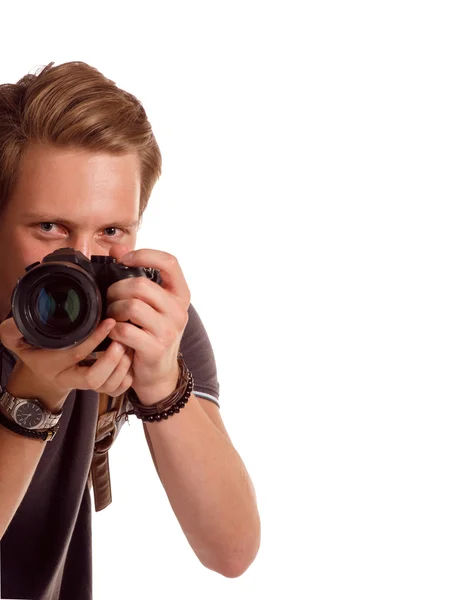 Primo piano ritratto di un giovane che scatta una foto da un angolo — Foto Stock