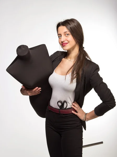 Woman tailor holding on Mannequin — Stock Photo, Image