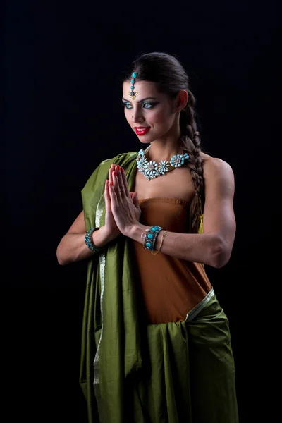 Beautiful Indian girl dancing in national dress — Stock Photo, Image