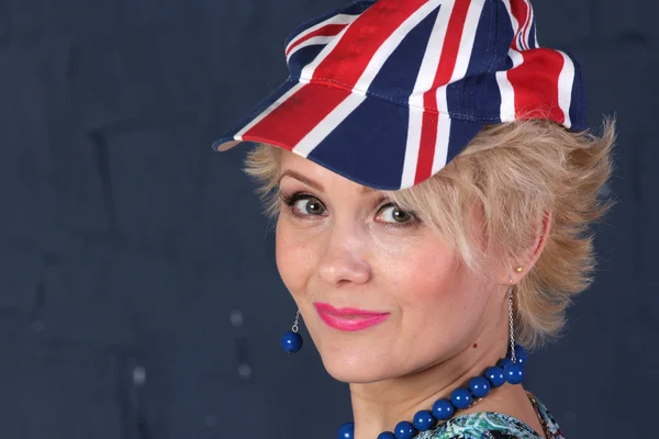 Adult woman in union jack cap — Stock Photo, Image