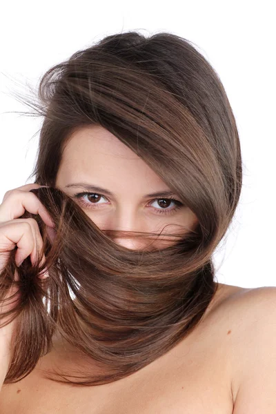 Žena skrýt obličej do vlasů — Stock fotografie