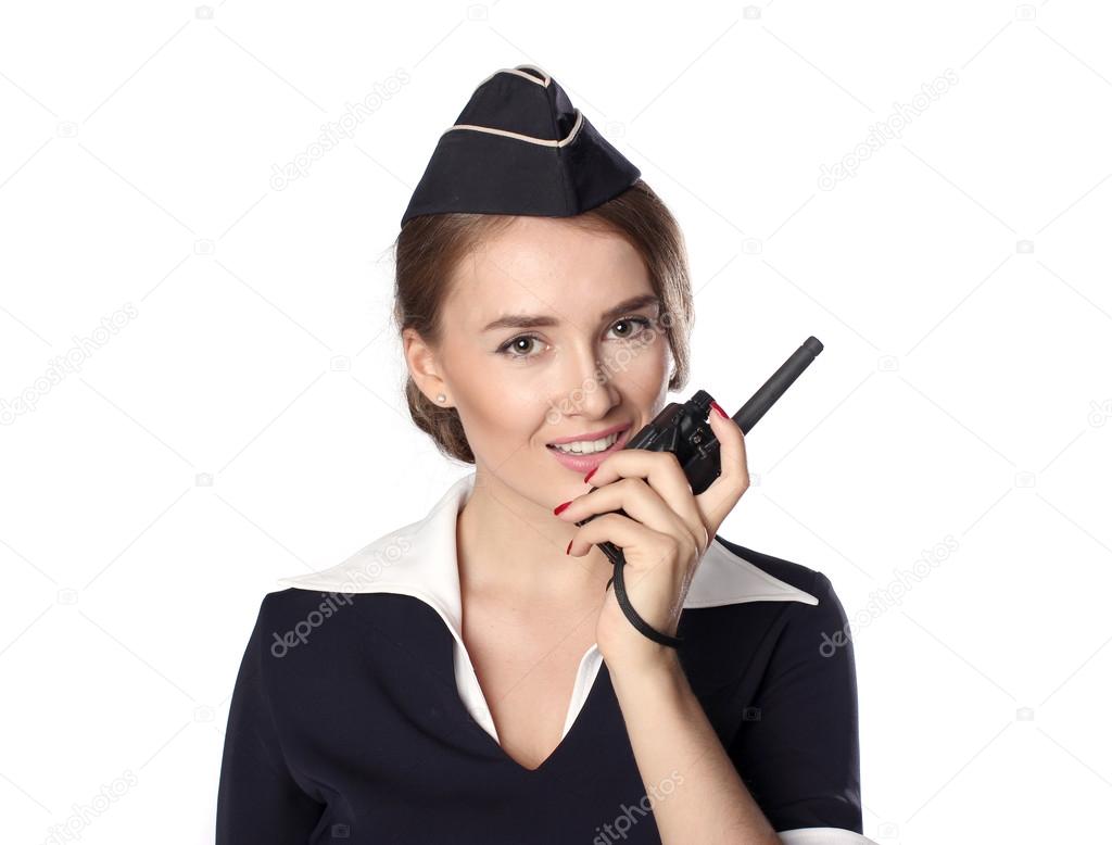 Beautiful smiling stewardess isolated on a white background