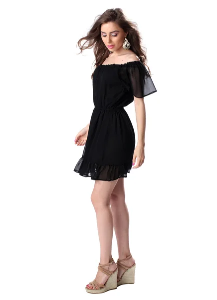 Portrait of a beautiful girl in a little black dress — Stock Photo, Image