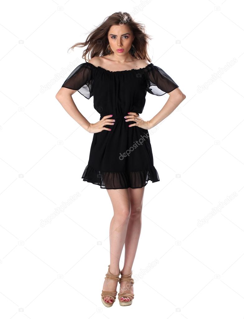 Portrait of a beautiful girl in a little black dress
