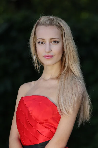 Lady in red outdoors — Stock Photo, Image