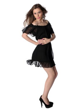 Attractive girl in a little black dress isolated