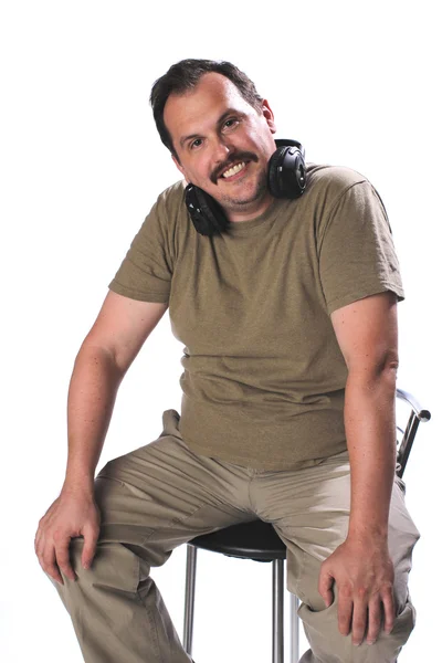 Retrato de un hombre con auriculares — Foto de Stock