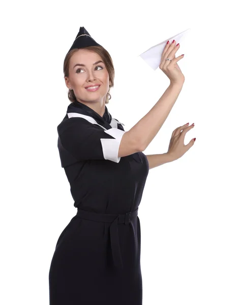 Stewardess mit Papierflugzeug — Stockfoto