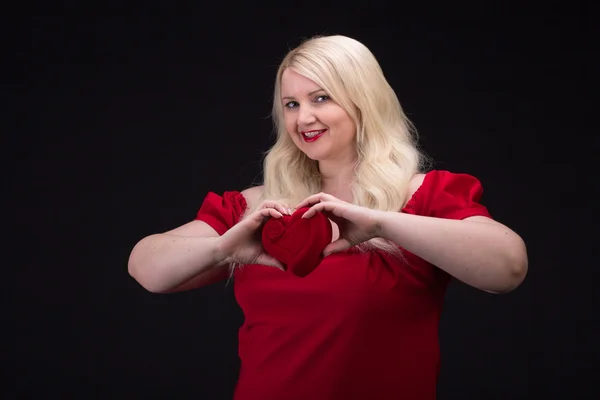 Plus size woman  with gift box — Stock Photo, Image