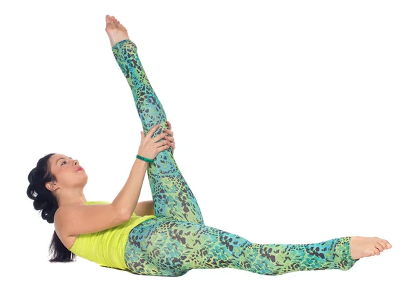 Young woman practicing yoga, lying on back with feet up variatio — Stock Photo, Image