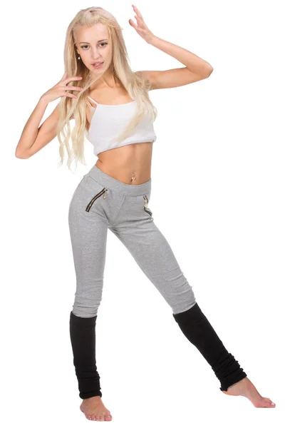 Young slim beautiful woman warming up before working out — Stock Photo, Image