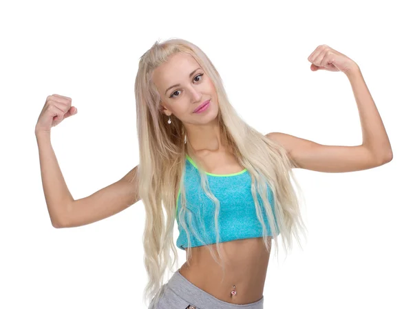 Sport jonge vrouw met perfecte lichaam tonen biceps — Stockfoto