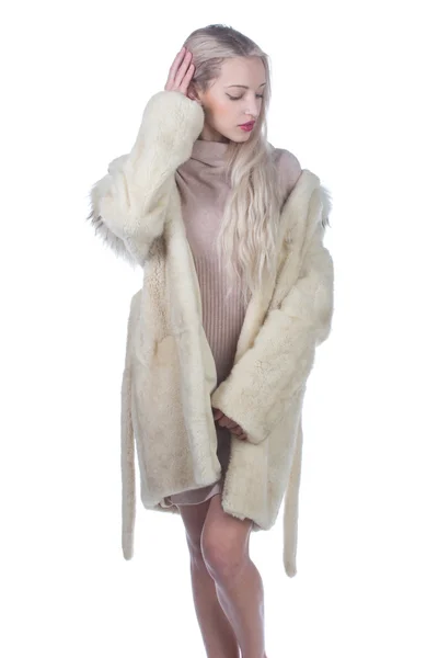 Young Woman Fashion Model dressed in white fur coat — Stock Photo, Image