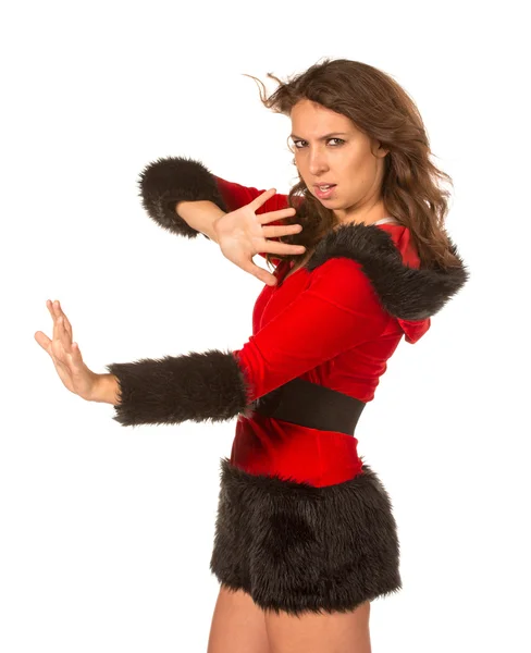Flicka i nyårsafton kostym kämpa med vinden — Stockfoto
