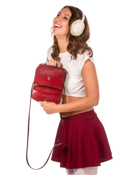 Mooie vrouw op zoek via haar tas pocket boek — Stockfoto