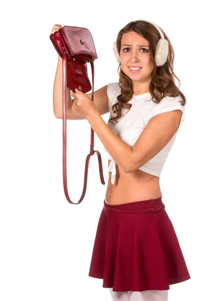 Hermosa mujer mirando a través de su bolso de bolsillo — Foto de Stock