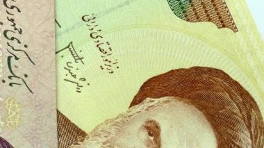 İran rials banknotlar kümesi. Riyali Iran ulusal para birimidir. Döndürme