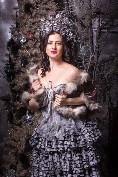 Christmas concept. Pretty woman in carnival dress. — Stock Photo, Image