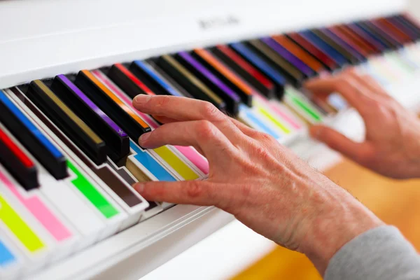 Piano with multy colour keys. Close up — Stock Photo, Image