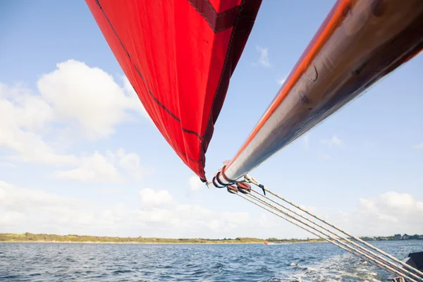 Wooden boat with sail — Stock Photo, Image