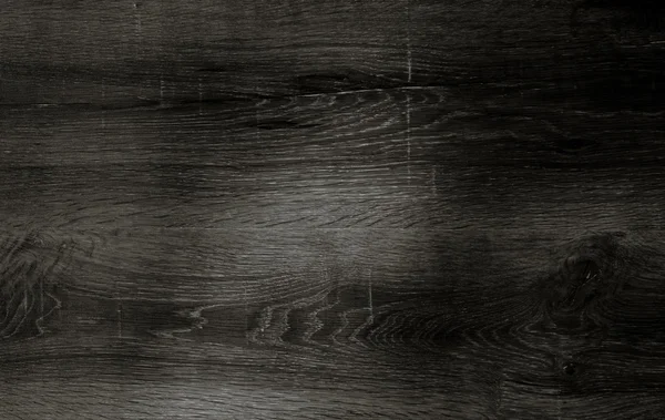 黒の背景の木目テクスチャ — ストック写真