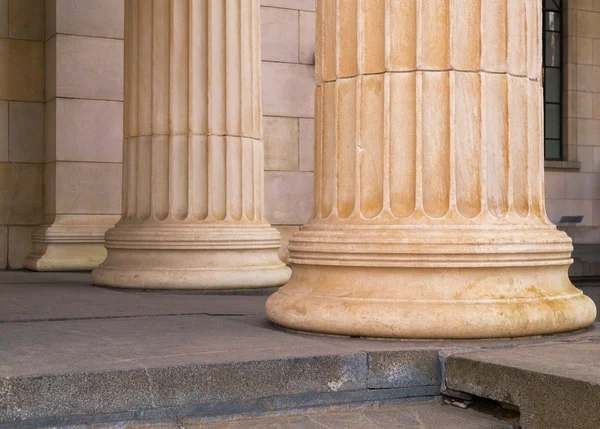 Many old greek columns in a row — Stock Photo, Image