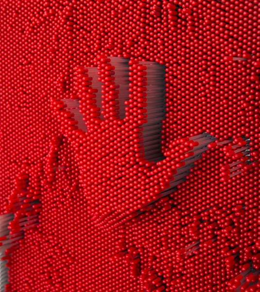 Hand pressed to red pin art board — Stock Photo, Image