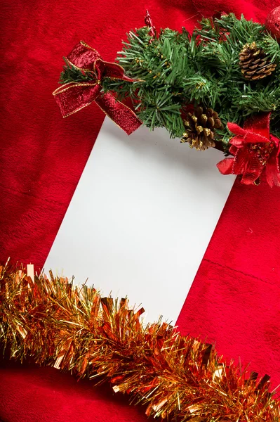 Christmas card with white paper on red Stock Photo