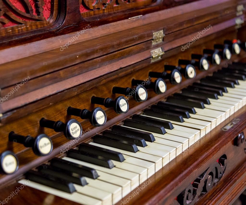 Closeup of antique reed organ harmonium — Stock Photo © gilmanshin