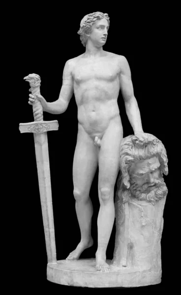 David og Goliat er gamle statuer. Bibelsk historie. Antikkskulptur isolert på svart bakgrunn – stockfoto