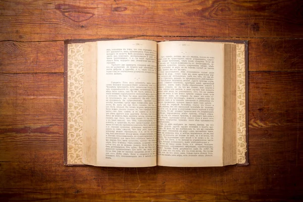 Open Book on old wood background — Stock Photo, Image