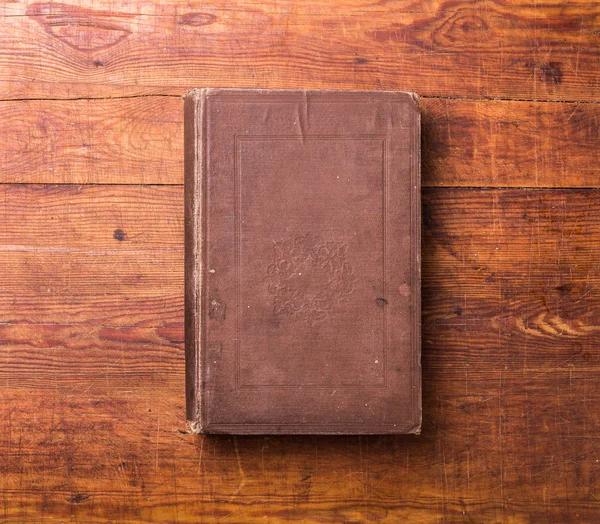 Photo blank book cover on textured wood background — Stock Photo, Image