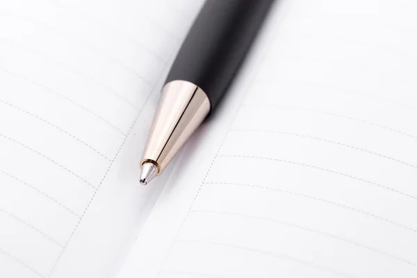 Ball pen and office pad — Stock Photo, Image