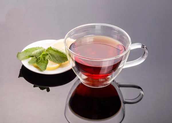 Cup of tea with cinnamon and mint — Stock Photo, Image