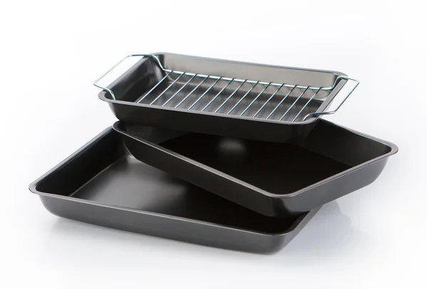 Metal baking tray isolated on white — Stock Photo, Image