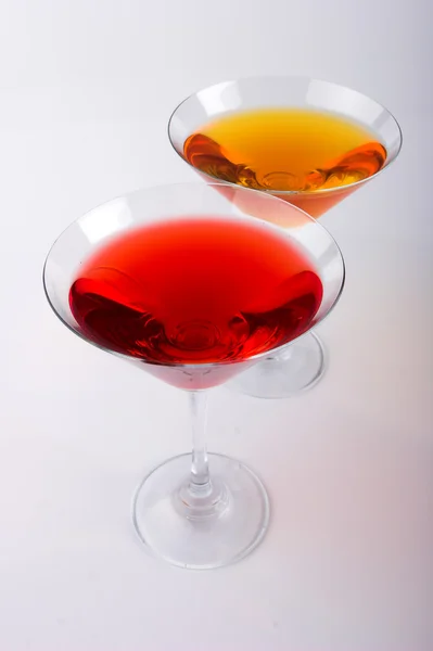 Two various glasses of martini isolated on a white background — Stock Photo, Image