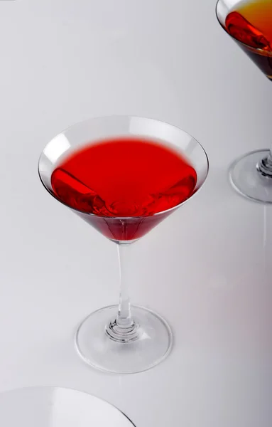 Two various glasses of martini isolated on a white background — Stock Photo, Image