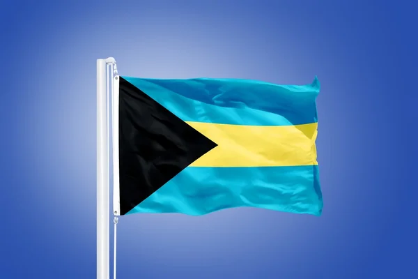 Bandera de Bahamas ondeando contra un cielo azul — Foto de Stock